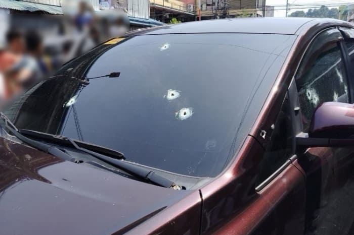 Vehicle of the Philippine Coast Guard personnel peppered by bullets. PCG photo